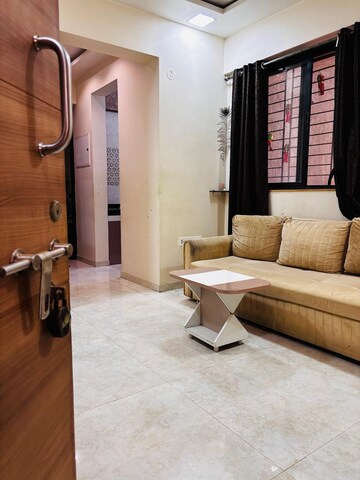 Living Room in 1 BHK Apartment at Lodha Palava Eviva K To T Urbano A C F and I To T, Dombivli East – for Sale