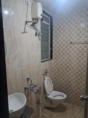Bathroom in 1 BHK Apartment at Romell Shraddha, Borivali West – for Rent