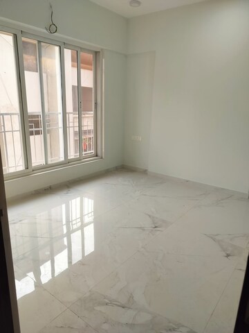 Room in 2 BHK Apartment at JP Eminence, Andheri West – for Rent