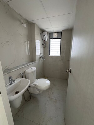 Bathroom in 1 BHK Apartment at Runwal Gardens Phase I, Dombivli East – for Rent