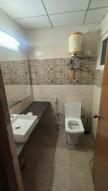 Bathroom in 1 BHK Apartment at Paramount Golfforeste, Zeta I Greater Noida – for Rent