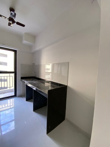 Kitchen in 2 BHK Apartment at Runwal Gardens Phase I, Dombivli East – for Rent