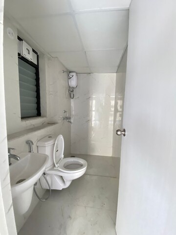 Bathroom in 2 BHK Apartment at Runwal Gardens Phase I, Dombivli East – for Rent