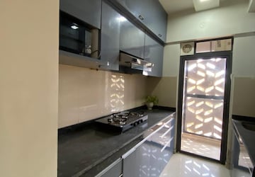 Kitchen in 3 BHK Apartment at Runwal Gardens Phase I, Dombivli East – for Rent