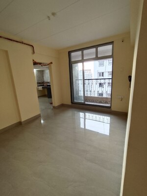 Room in 2 BHK Apartment at Lotus Tower CHS, Kalyan West – for Sale