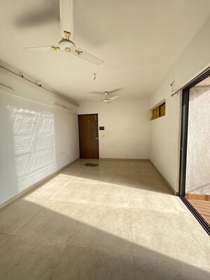 Living Room in 1 BHK Apartment at Lodha Palava City Lakeshore Greens, Dombivli East – for Rent