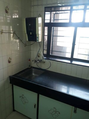Kitchen in 2 BHK Apartment at Acme Anand Dham, Andheri East – for Rent