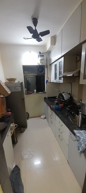 Kitchen in 1.5 BHK Apartment at Dosti Vihar, Samata Nagar – for Rent