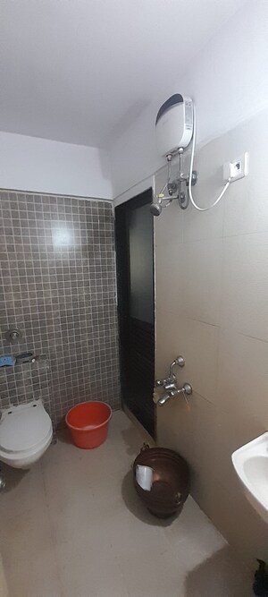 Bathroom in 1.5 BHK Apartment at Dosti Vihar, Samata Nagar – for Rent