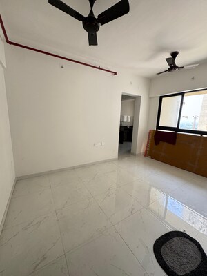 Living Room in 1 BHK Apartment at Runwal Gardens Phase 2, Dombivli East – for Rent