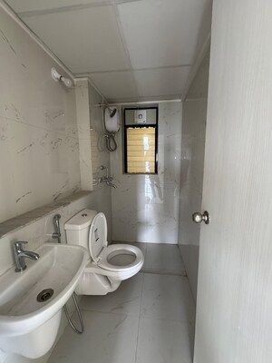Bathroom in 2 BHK Apartment at Runwal Gardens Phase I, Dombivli East – for Rent