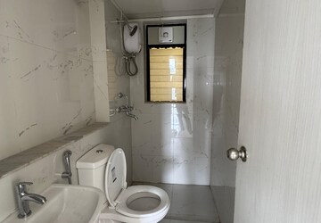 Bathroom in 2 BHK Apartment at Runwal Gardens Phase I, Dombivli East – for Rent