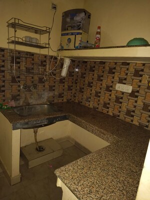 Kitchen in 2 BHK Apartment at Dhakoli – for Rent