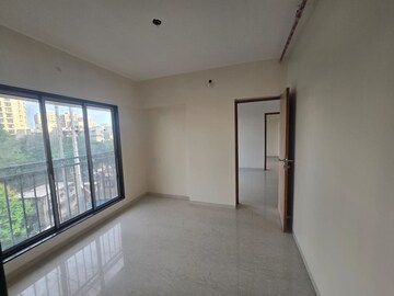 Room in 2 BHK Apartment at Ajmera Boulevard, Malad West – for Rent