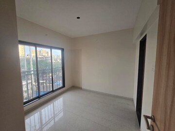 Room in 2 BHK Apartment at Ajmera Boulevard, Malad West – for Rent