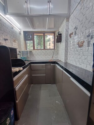 Kitchen in 2 BHK Apartment at Ajmera Boulevard, Malad West – for Rent