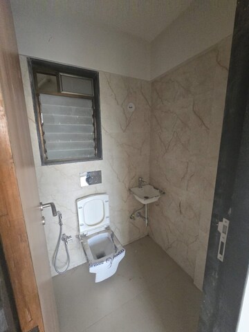 Bathroom in 2 BHK Apartment at Ajmera Boulevard, Malad West – for Rent