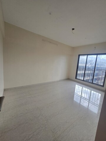 Room in 2 BHK Apartment at Ajmera Boulevard, Malad West – for Rent