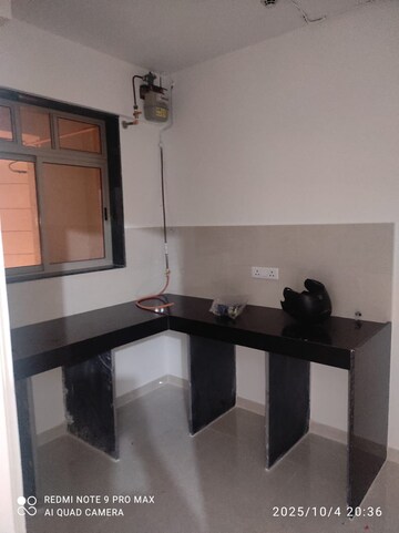 Kitchen in 1 BHK Apartment at Hiranandani Estate Villa Carino, Thane West – for Rent