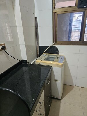 Kitchen in 1.5 BHK Apartment at Luv Kush Tower, Chembur – for Rent