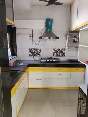 Kitchen in 2 BHK Apartment at Runwal Garden City, Balkum Pada – for Rent