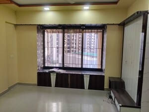 Living Room in 2 BHK Apartment at Runwal Garden City, Balkum Pada – for Rent