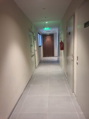 Building Lobby in 2 BHK Apartment at Krisumi Waterfall Suites, Sector 36a – for Rent