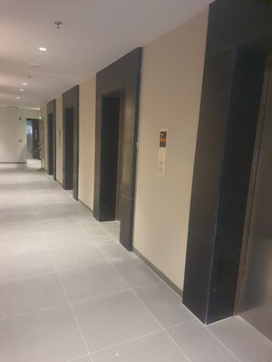 Building Lobby in 2 BHK Apartment at Krisumi Waterfall Suites, Sector 36a – for Rent