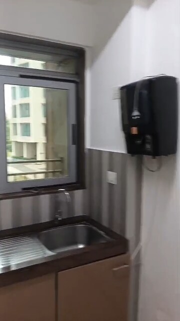 Kitchen in 2 BHK Apartment at Kalpataru Sunrise Grande, Kolshet Road – for Rent
