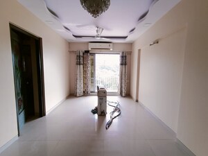 Room in 1 BHK Apartment at Oxford Navrang Heights, Kandivali West – for Sale