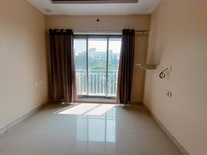 Room in 1 BHK Apartment at Oxford Navrang Heights, Kandivali West – for Sale