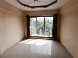 Room in 1 BHK Apartment at Oxford Navrang Heights, Kandivali West – for Sale