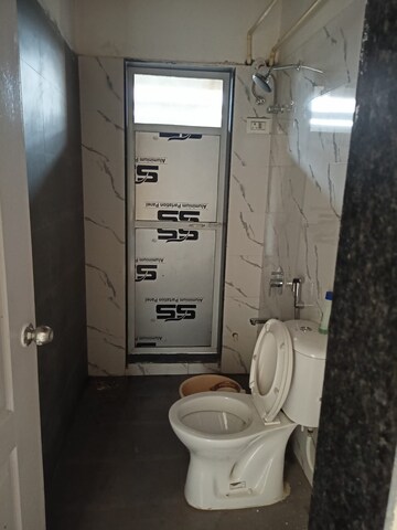 Bathroom in 2 BHK Apartment at Sunrise Glory, Shilphata – for Rent