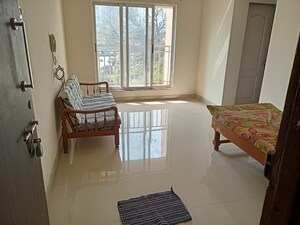 Living Room in 2 BHK Apartment at Sunrise Glory, Shilphata – for Rent