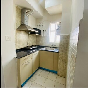 Kitchen in 1 BHK Apartment at Paras Tierea, Sector 137 – for Sale