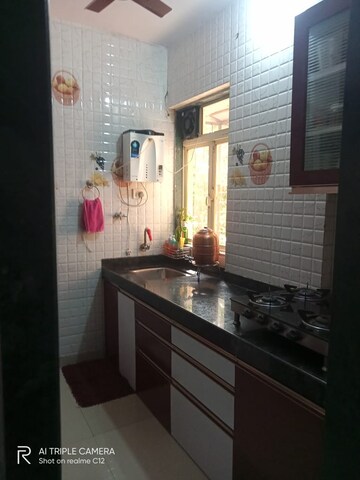 Kitchen in 2 BHK Apartment at Dosti Planet North Emerald, Shilphata – for Sale