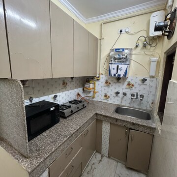 Kitchen in 1 BHK Builder Floor at Kotla Mubarakpur – for Rent