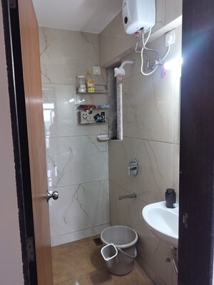 Bathroom in 1 BHK Apartment at Raunak Heights, Ghodbunder Road – for Rent