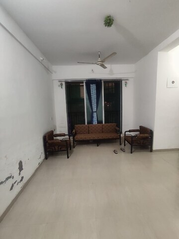 Living Room in 1 BHK Apartment at Raunak Heights, Ghodbunder Road – for Rent