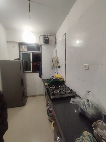 Living Room in 1 BHK Apartment at Raunak Heights, Ghodbunder Road – for Rent