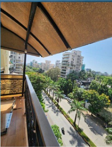 Balcony in 4 BHK Apartment at Rustomjee 9 JVPD, Juhu – for Rent