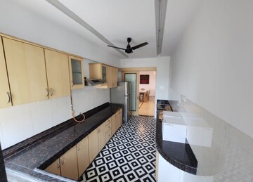 Kitchen in 4 BHK Apartment at Rustomjee 9 JVPD, Juhu – for Rent