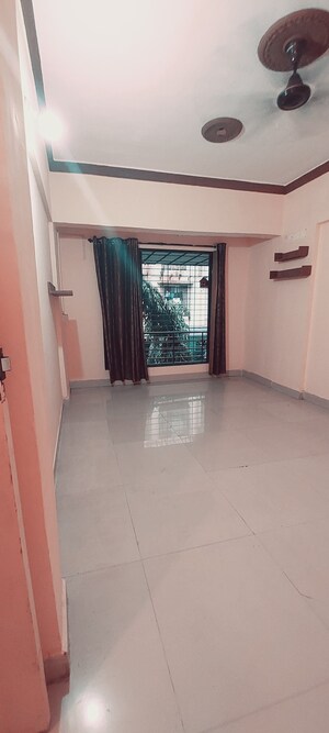 Living Room in 1 BHK Apartment at Ghansoli Sector 21 – for Sale