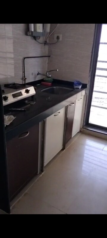 Kitchen in 1 BHK Apartment at Nilgiri Tower Agripada, Agripada – for Sale