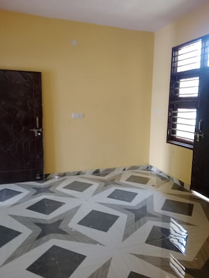 Bedroom in 1.5 BHK Builder Floor at Sector 18 – for Rent