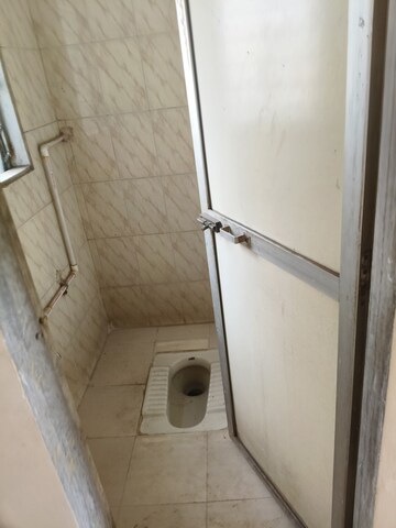 Bathroom in 2 BHK Apartment at Jay Sadguru Darshan CHS, Kalyan West – for Sale