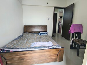 Bedroom in 1 BHK Apartment at Mantra Insignia, Mundhwa – for Rent