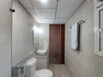 Bathroom in 2 BHK Apartment at Bhartiya Nikoo Homes Phase 2, Thanisandra Main Road – for Rent