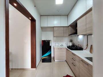 Kitchen in 2 BHK Apartment at Bhartiya Nikoo Homes Phase 2, Thanisandra Main Road – for Rent