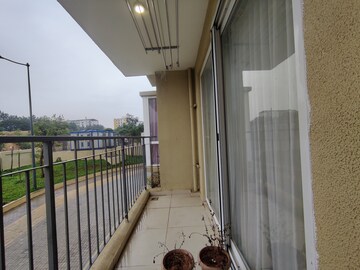 Balcony in 2 BHK Apartment at Bhartiya Nikoo Homes Phase 2, Thanisandra Main Road – for Rent